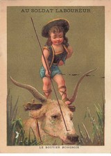 CHROMO #MK40972 AU SOLDAT LABOUREUR UN ENFANT SUR LA TETE D UN BOEUF LE BOUVIE