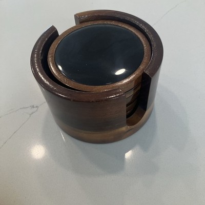 handcrafted Brazilian agate and wood coasters featuring polished black agate