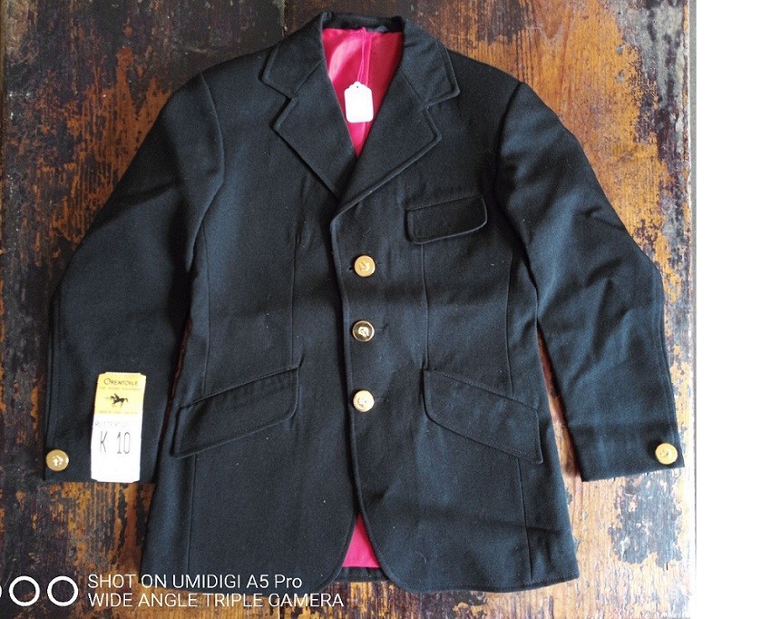 Veste de concours équitation enfant 10 ans pour le premier podium