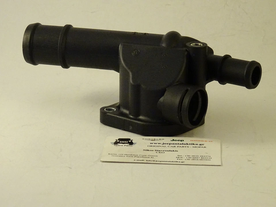 Carcasa de salida de agua Jeep Compass / Patriot MK 07-09 68001300AA nueva generación Mopar Foto 2 de 4