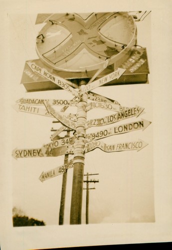 1940's WWII Crossroads of the Pacific sign, Kau Kau Korner Waikiki Hawaii Photo