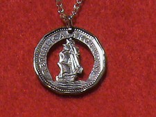 Hand cut Argentina coin with a ship Used as a Pendant includes a 24 inch cha