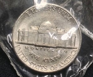 1989 P Jefferson Nickel With Full Steps And DDR In Mint State Quality.