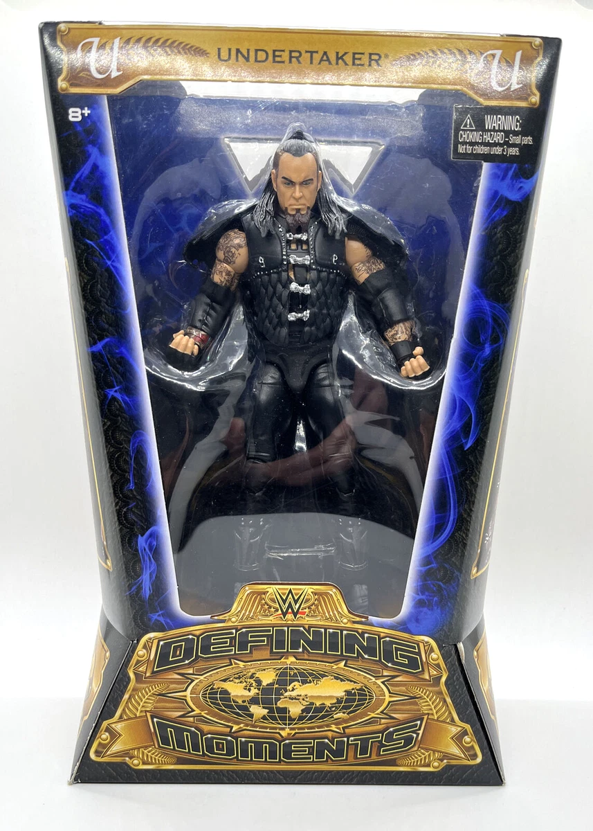 Defining moments hotsell undertaker action figure