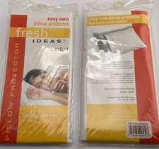Two Standard size pillow protectors new in pkg.