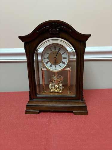 Bulova Clocks B1845 Durant Walnut Wood and Glass Revolving Pendulum Clock, Brown - Picture 1 of 6