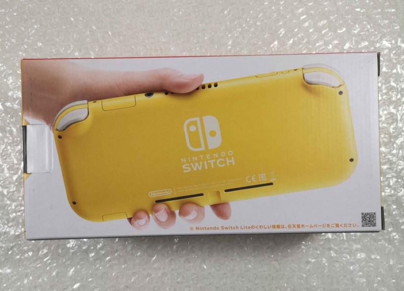 Console Nintendo Switch Lite jaune version import Japon pour le jeu portable - 2