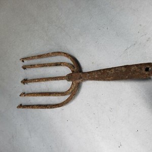 Antique forged iron fish handling tool