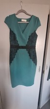 Gorgeous Bodycon Dress  A Stunning Green Colour With Black Lace Panels At Sides