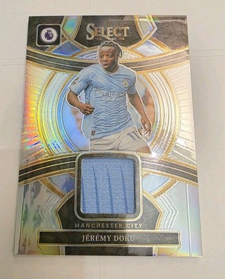 23/24 Panini Select Swatches Man City Jeremy Doku SS-JD