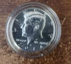2014 d 90% silver unciurculated Kennedy half dollar in acrylic capsule