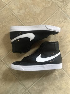 black nike shoes with gold swoosh women's