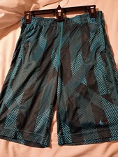 Nike boys shorts size med.teal, black color