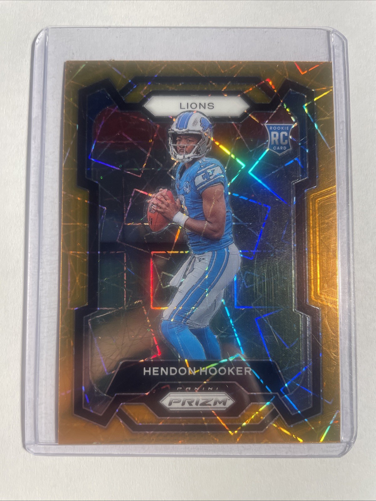 2023 Panini Prizm Hendon Hooker Orange Lazer Prizm Rookie #329 Detroit Lions RC
