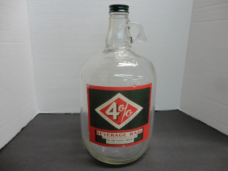 4%  FOUNTAIN SODA SYRUP 1 GAL  PAPER LABEL JUG CLEAR  GLASS