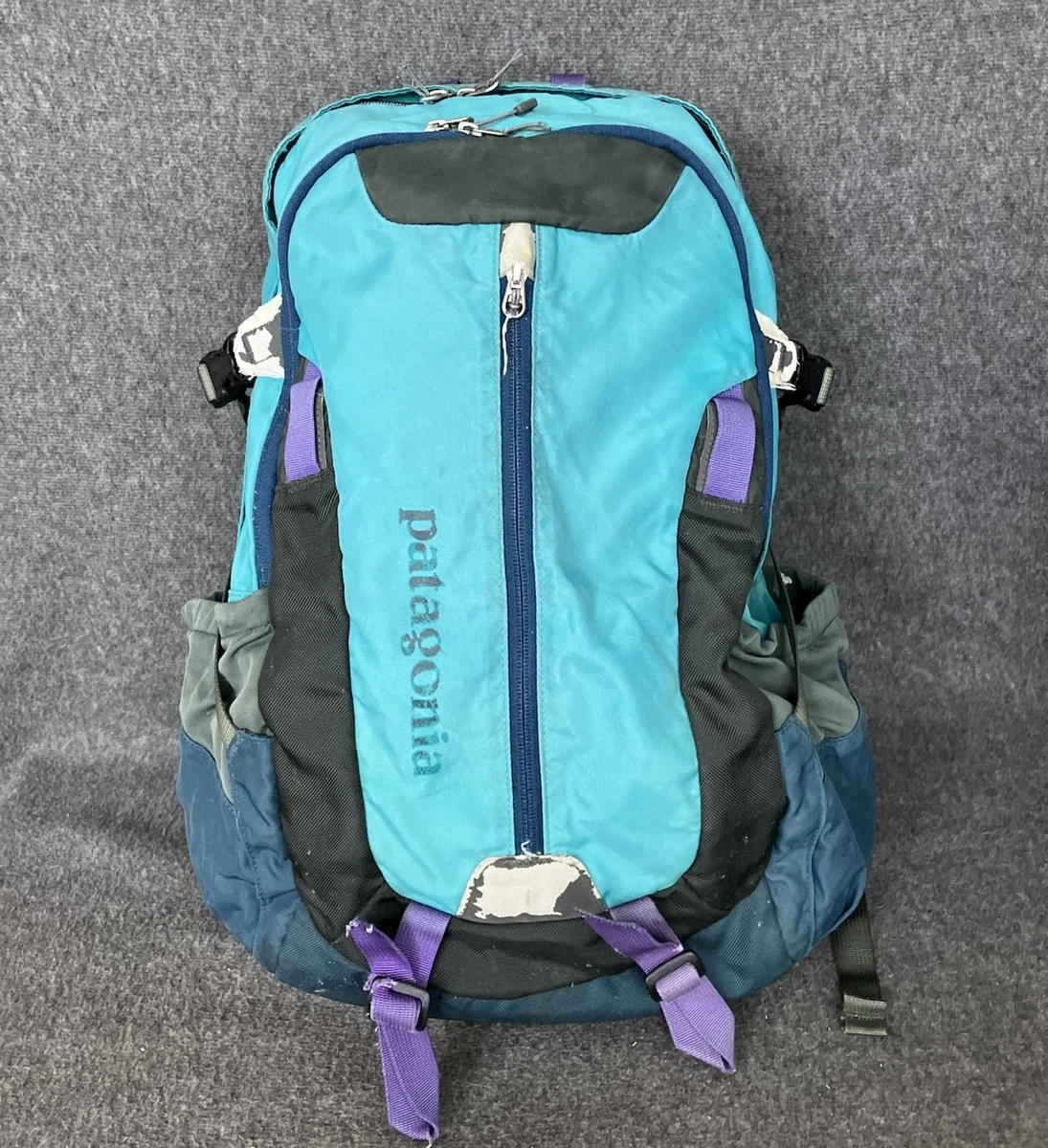 patagonia backpack yellow Guidewater Old Souls NY featuring a body and webbing made of sturdy 100% recycled nylon and a back panel Patagonia Black Hole MLC 45L-Black/Black