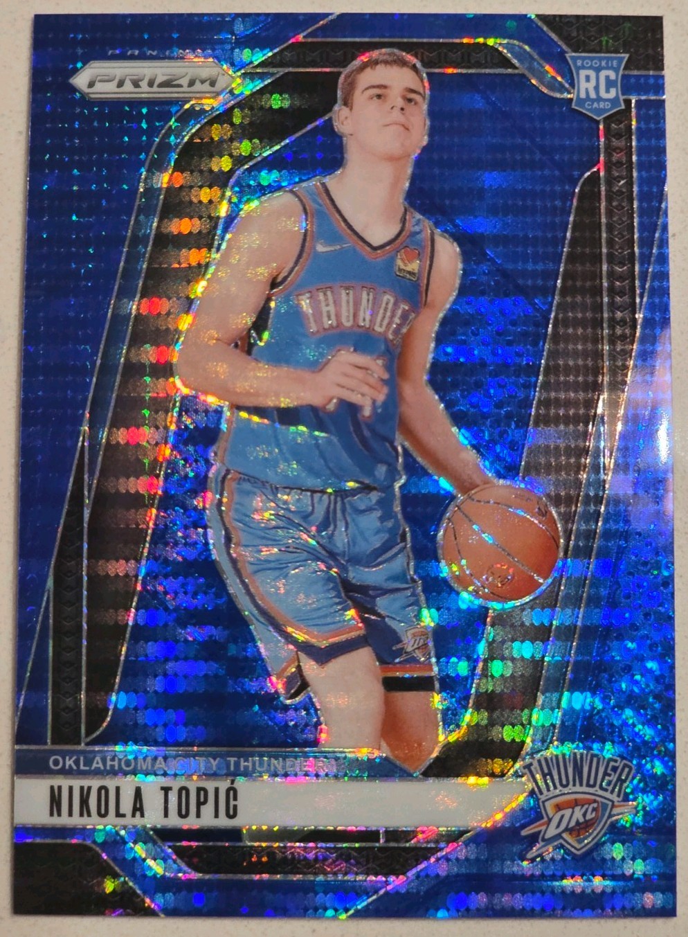 2024-25 Panini Prizm Nikola Topic #230 Blue Pulsar Prizm /99 (RC)