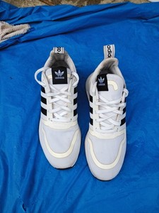 Adidas black and white tennis shoe size 10
