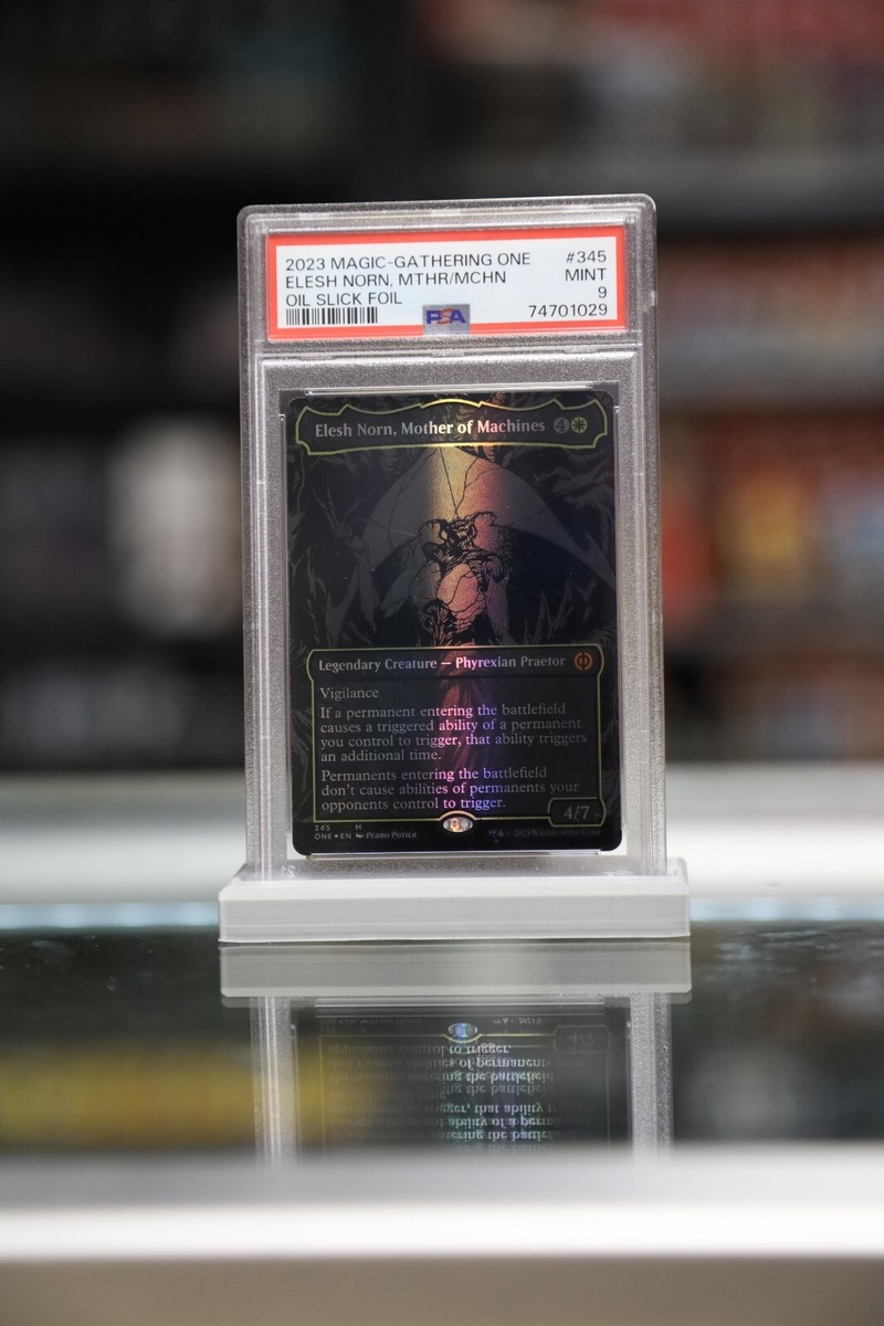 PSA 9 Elesh Norn, Mother of Machines (Oil Slick Raised Foil