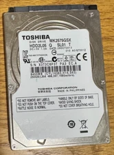 MK2575GSX, A0/GT001z, HDD2L05 Q SL01 T, Toshiba 250GB SATA 2.5 Hard Drive