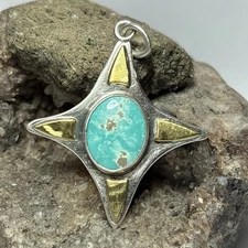 27 Ct Tw Natural Lone Mountain  Turquoise Sterling Silver & Bronze Star Pendant