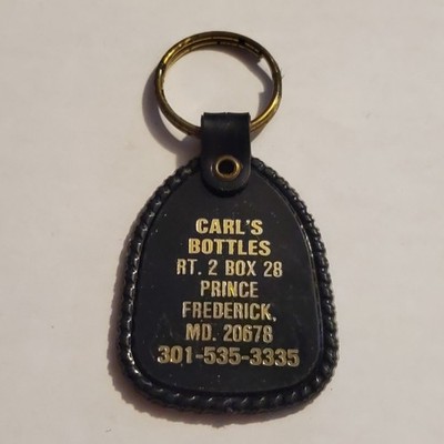 Vintage Carl's Bottles Prince Frederick MD Maryland Black Plastic Keychain VTG