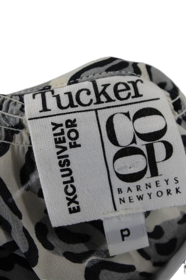 Elegante blusa blanca con estampado animal abotonada manga larga Tucker para mujer talla S Foto 4 de 4