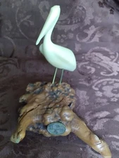 Pelican Figurine On Burlewood