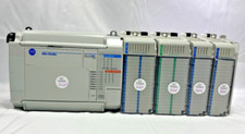 Allen-Bradley 1764-24BWA MicroLogix 1500 PLC w/ IQ32 OB32 2 IQ16 ECR