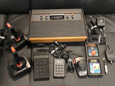 Atari 2600 VCS 4-Switch w/2 Joysticks, Keypads, Driving +Pac-Man +Star Raiders