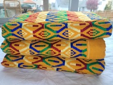 An authentic 6 yards Ghanaian vibrant Kente cloth.