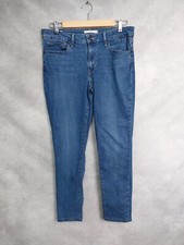 levi's 711, W30 L32, skinny jeans mid rise. medium blue wash. Zip Fly. VGC