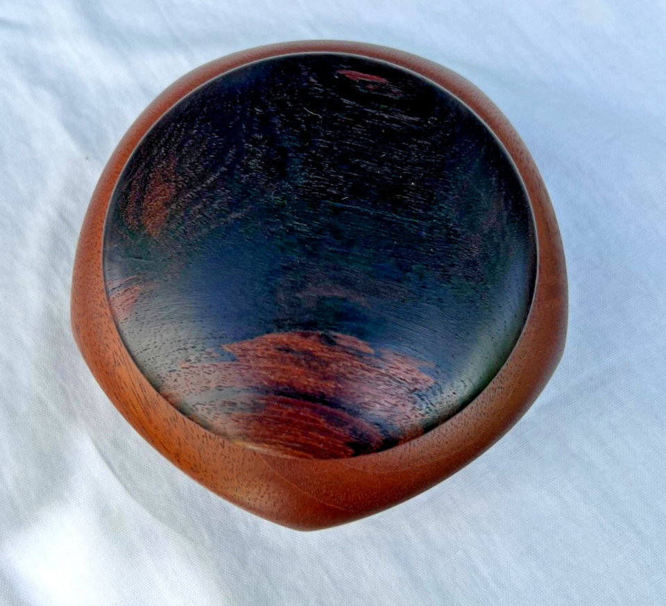 A signed, artist-made music box in mahogany and exotic bocote wood playing 'Amazing Grace' — signed craft objects are genuinely rare on the secondary market.