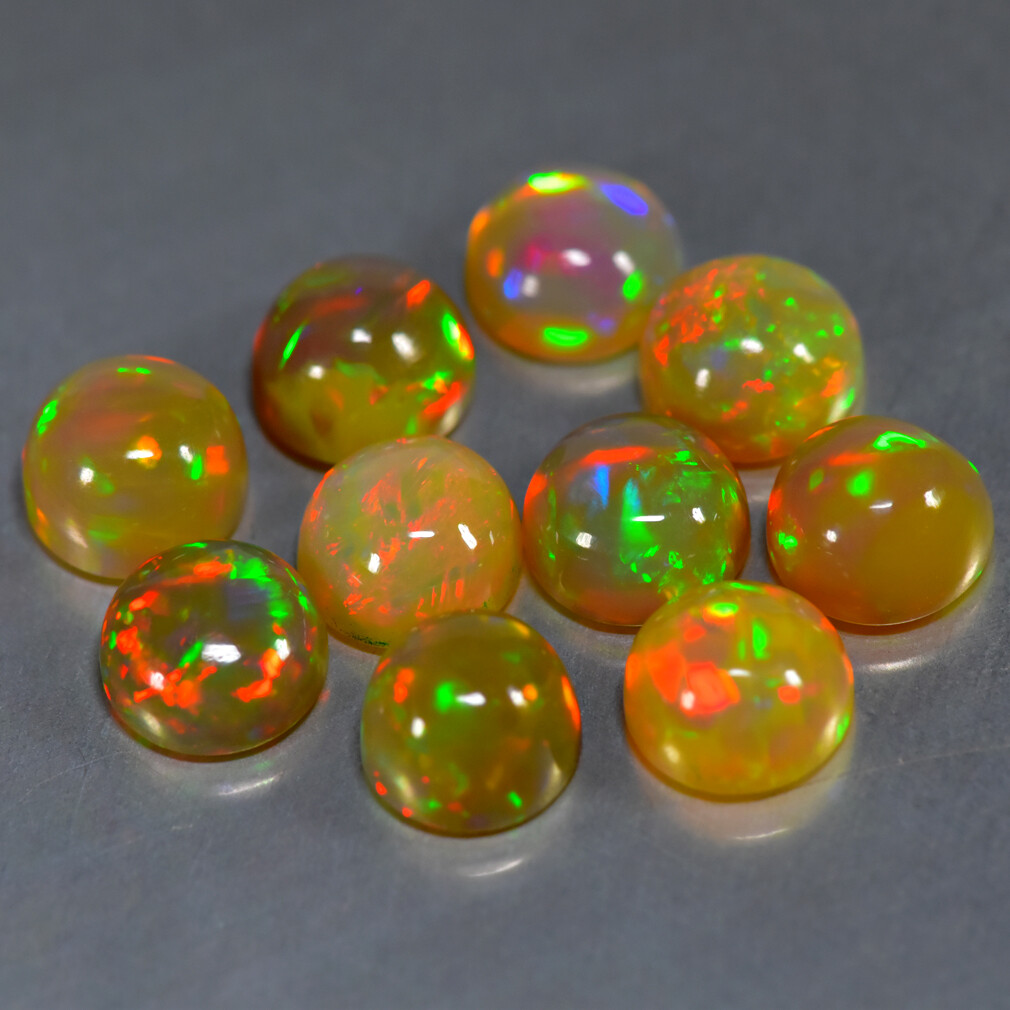 ETHIOPIAN WELO OPAL 9 MM ROUND MULTI FIRE FACETED CALIBRATED ALL NATURAL