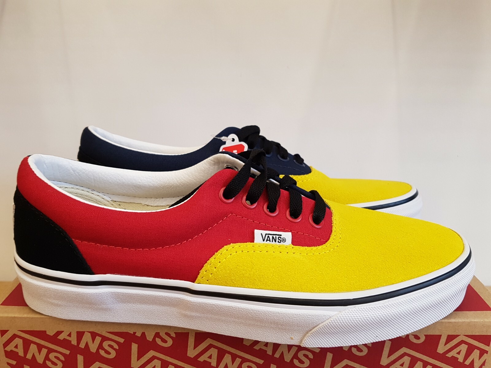 black yellow red vans