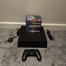 Sony PS4 Pro 1TB Black Console With 10 Games, power cable and controller