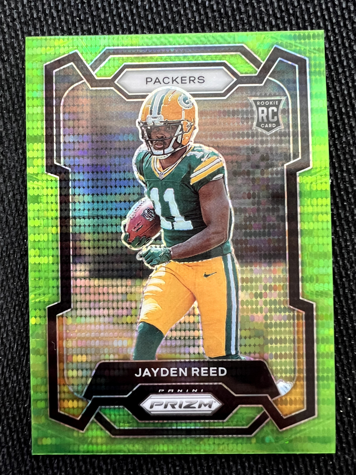 2023 Panini Prizm Jayden Reed #334 Neon Green Pulsar Prizm (RC) rookie Packers