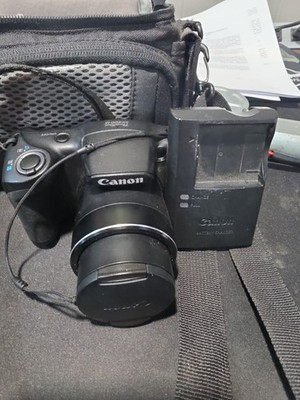 Canon PowerShot SX400 IS 16.0MP Digital Camera - Black (Kit w/ 4.3-129 mm Lens)