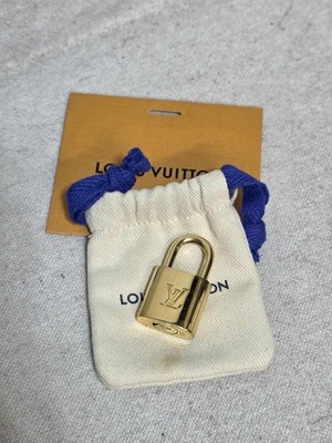 Authentic Louis Vuitton Lock 301,  Pouch And Box. No Key!