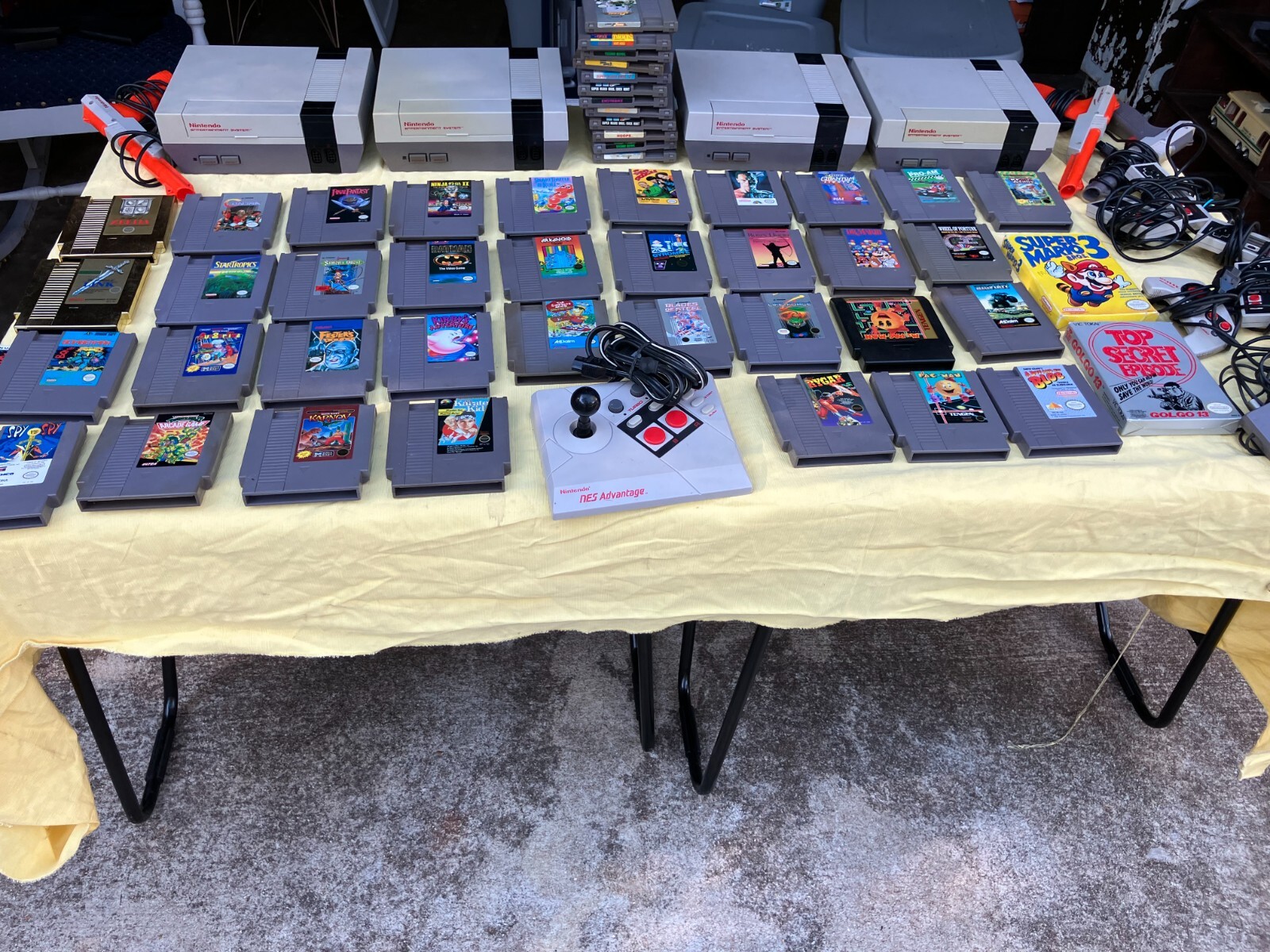 4 NES's, 48 games, 6 controllers, 3 zappers, and game room xtras No