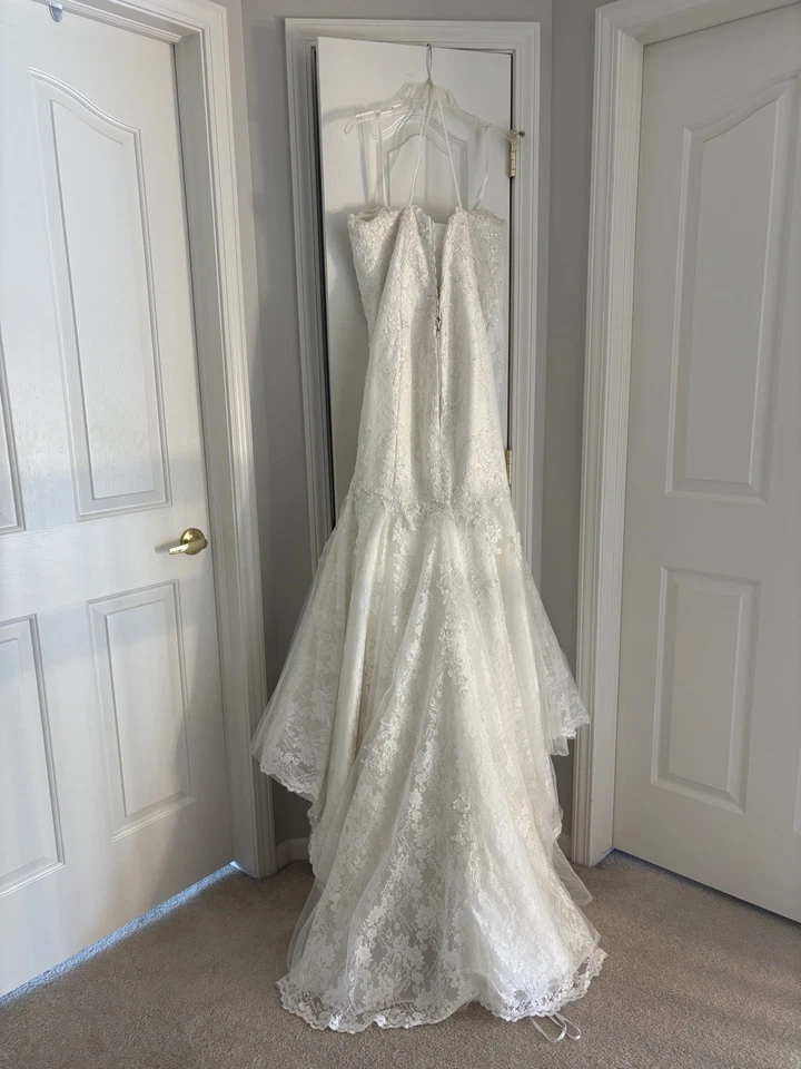 Vestido de novia sirena sin mangas de tul y encaje marfil talla 12-14 con velo.  Foto 2 de 4