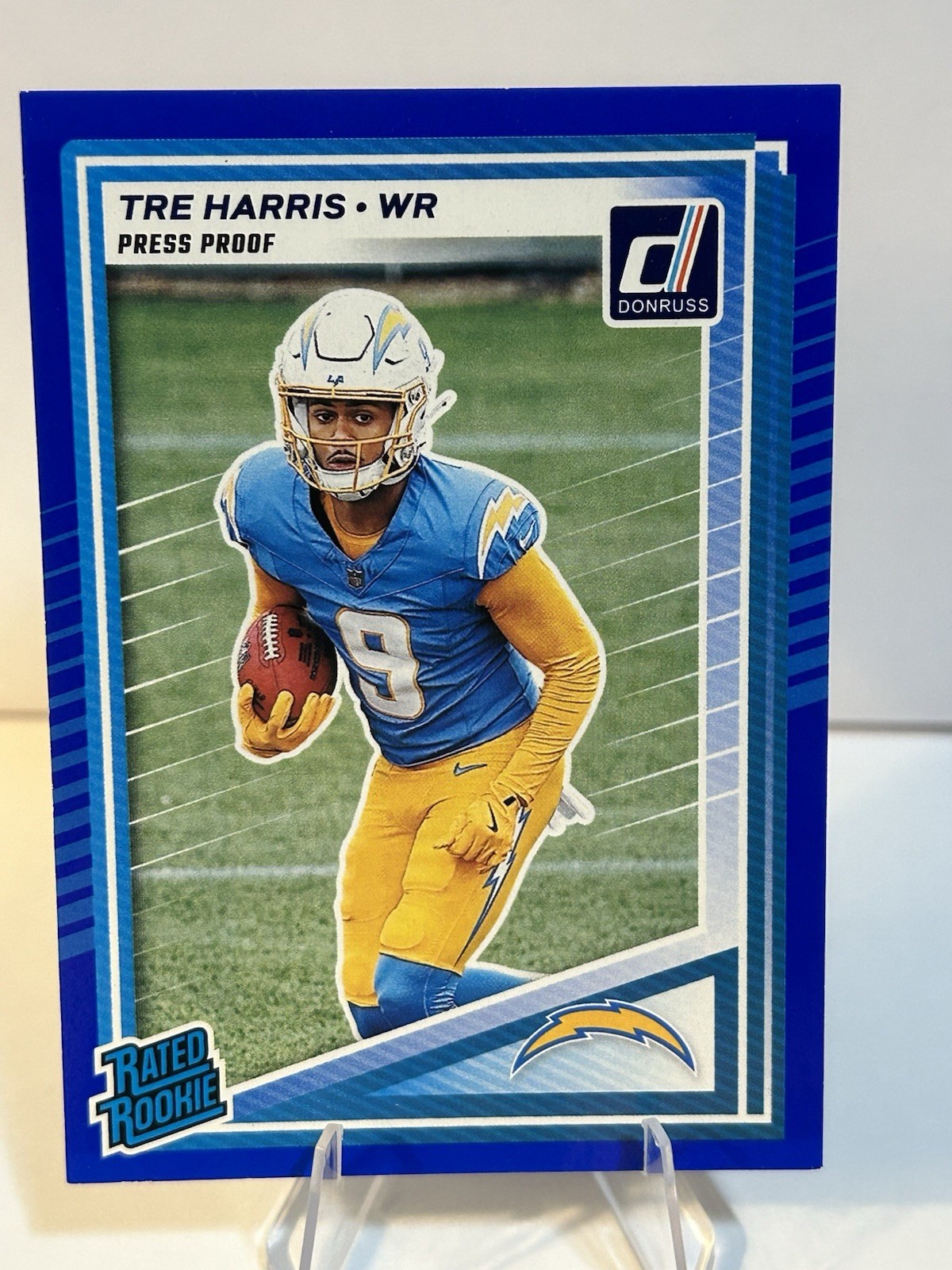 2025 Panini Donruss - Rated Rookie Tre Harris #329 Press Proof Blue (RC)