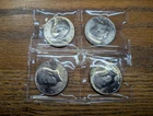 4 Stunning Uncirculated Kennedy Half Dollars