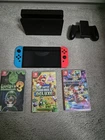 Nintendo Switch OLED Model HEG-001 Handheld Console - 64GB  with games