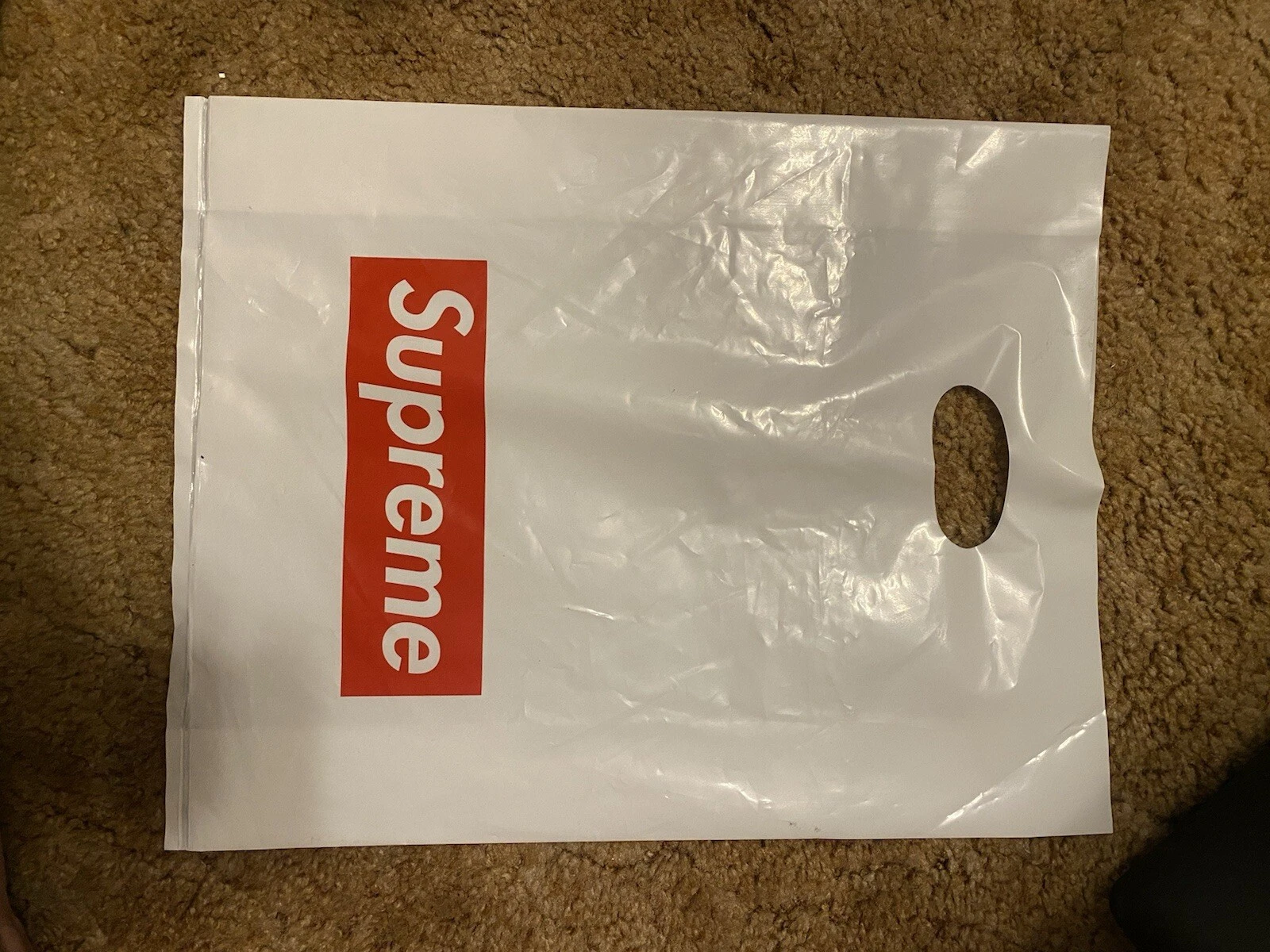 Sac shopping Supreme plastique rouge blanc