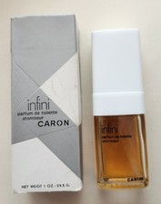 "Infini" by Caron. Parfum de Toilette Spray 1 fl oz.  Full with box