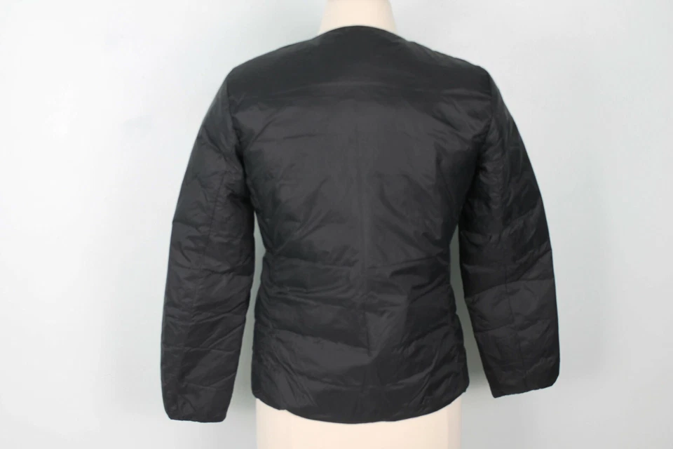Chaqueta acolchada Muji para mujer negra con botones delanteros cuello redondo talla M Foto 2 de 4