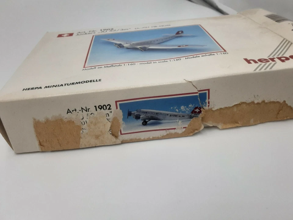 junkers JU 52/3m suisse herpa 1/160 boite carton usé sur un côté - Photo 4/4