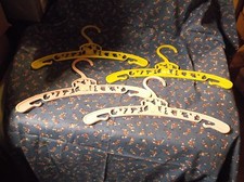 4 Vintage Children's Plastic Hangers 9 7/8" Wide 2 Pink 2 Yellow Variety Animals