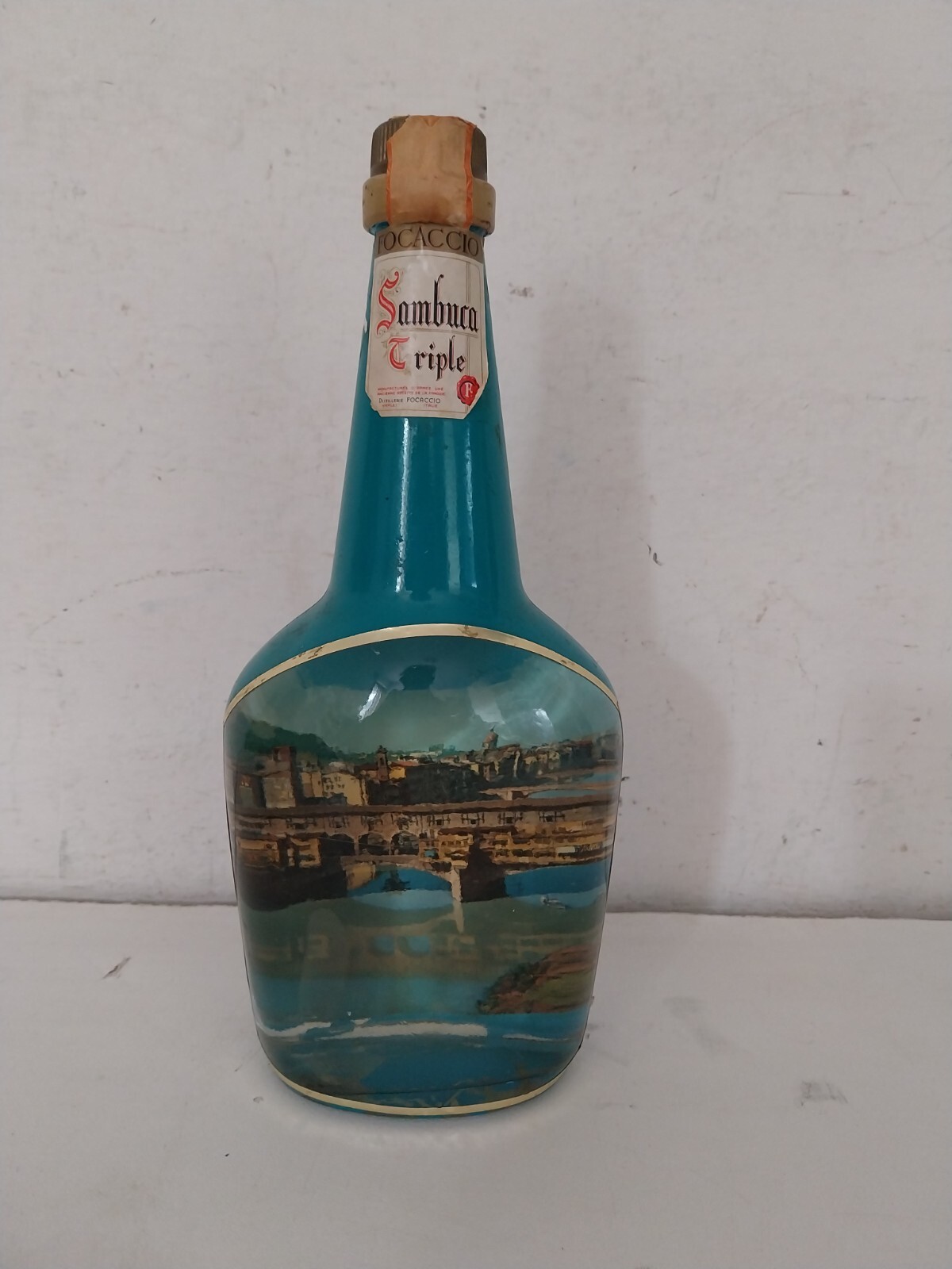 Bottiglia Sambuca Triple - Sfondo Ponte Vecchio Firenze- Distilleria Focaccio